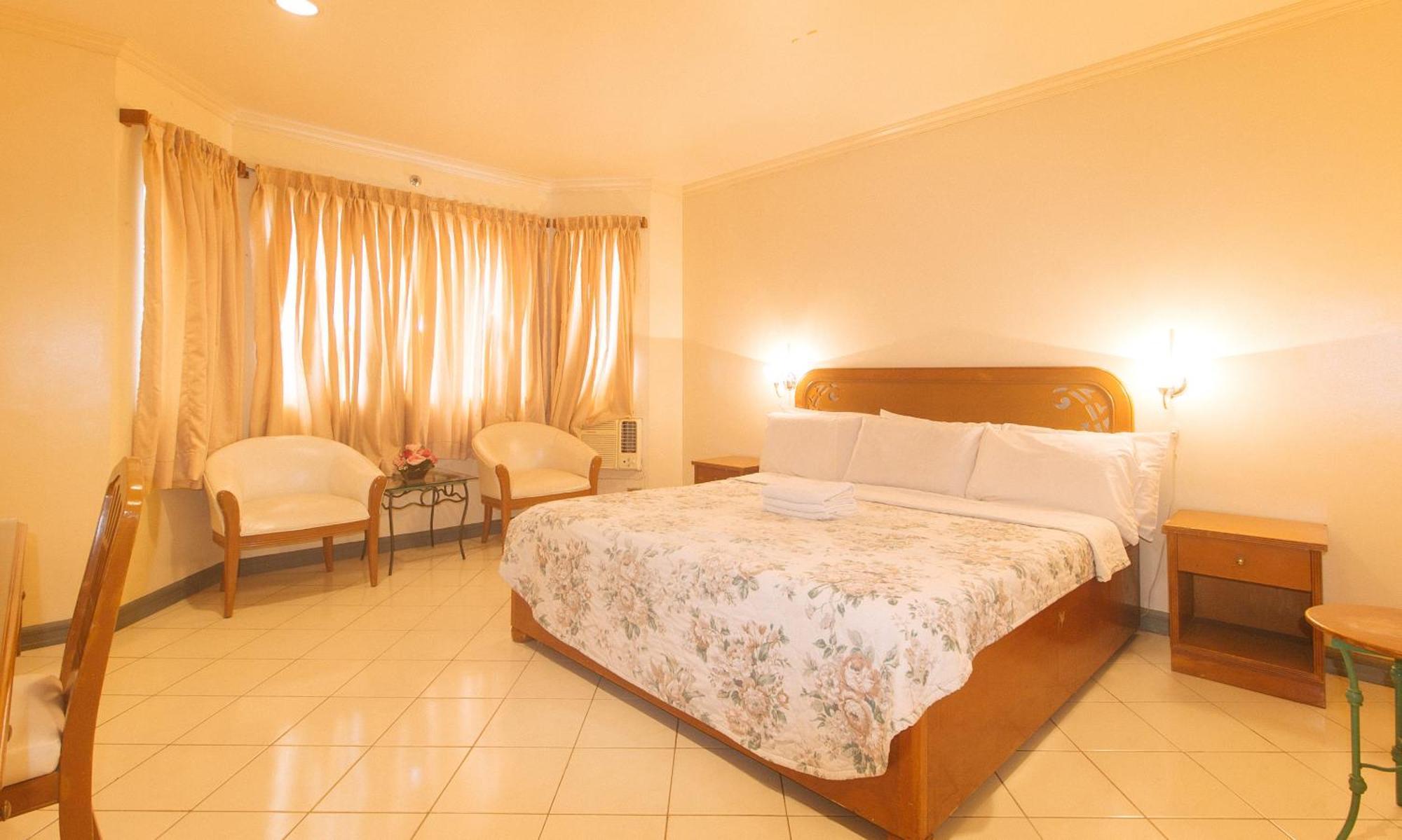 באקולוד Royal Am Rei Hotel By Reddoorz מראה חיצוני תמונה